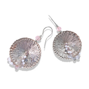 Large disc earrings in copper and silver with beads.