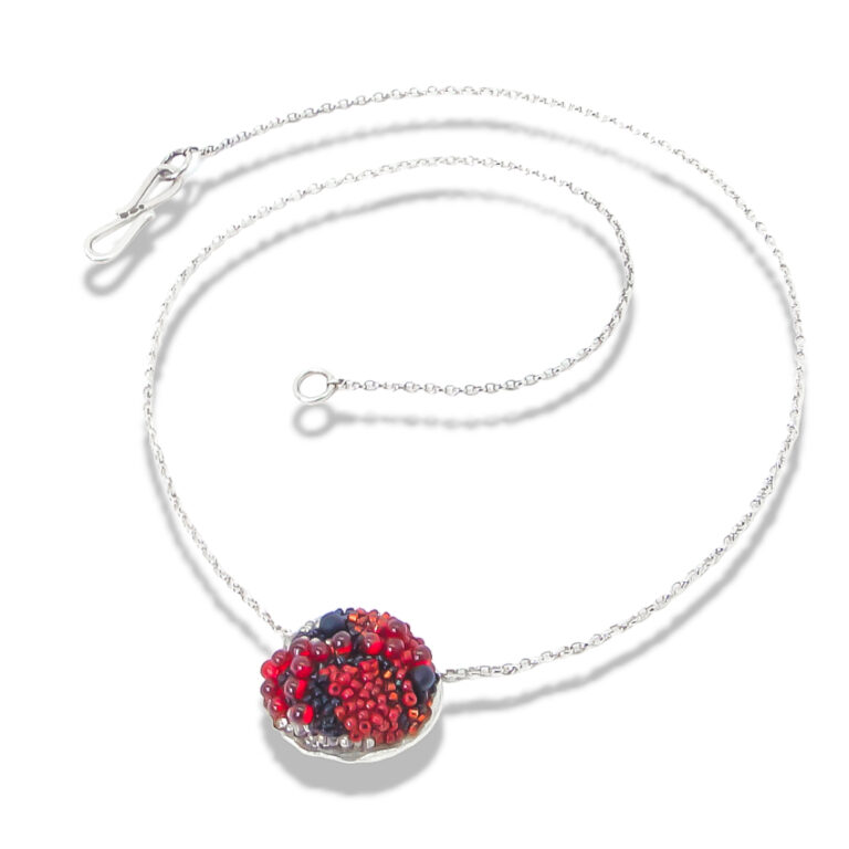 Pebble shaped pendant necklace.