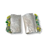 rectangular textured silver stud earrings with green beaded edging